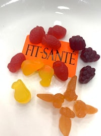 a plate of gummy bears with the word fit sante on it