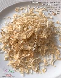 a white plate with dried leaves on it