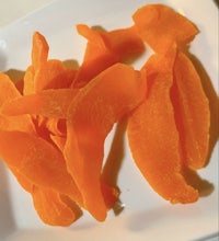 a plate of orange slices on a table