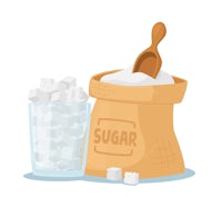 a bag of sugar with a spoon and a glass