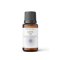 a bottle of sapin fr essential oil on a white background