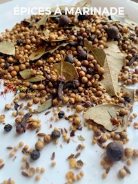 a plate with spices and seeds on it