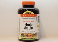 a bottle of huile de lin