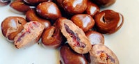 chocolate covered cranberries on a white plate