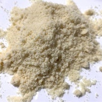 a pile of white powder on a white surface