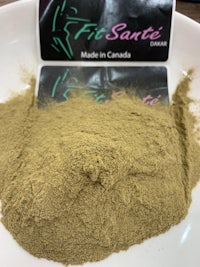 fit santa's green tea powder on a white plate