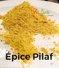 a plate of spice pilaf on a white plate