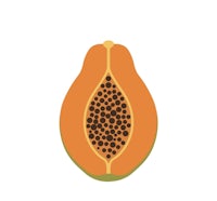 a papaya is cut in half on a white background