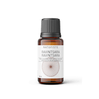 a bottle of rasvansga essential oil on a white background