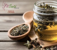 a jar of herbs and spices on a wooden table