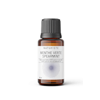 a bottle of menthe verte peppermint essential oil on a white background