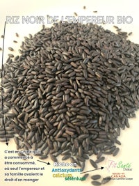 a pile of black seeds with a label on it