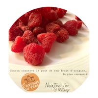 a white plate with raspberries on it