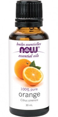 a bottle of orange essential oil
